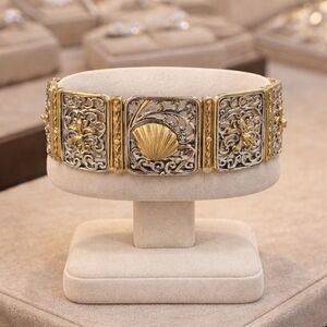 Sterling silver plated panel bracelet featuring gold-plated nautical accents